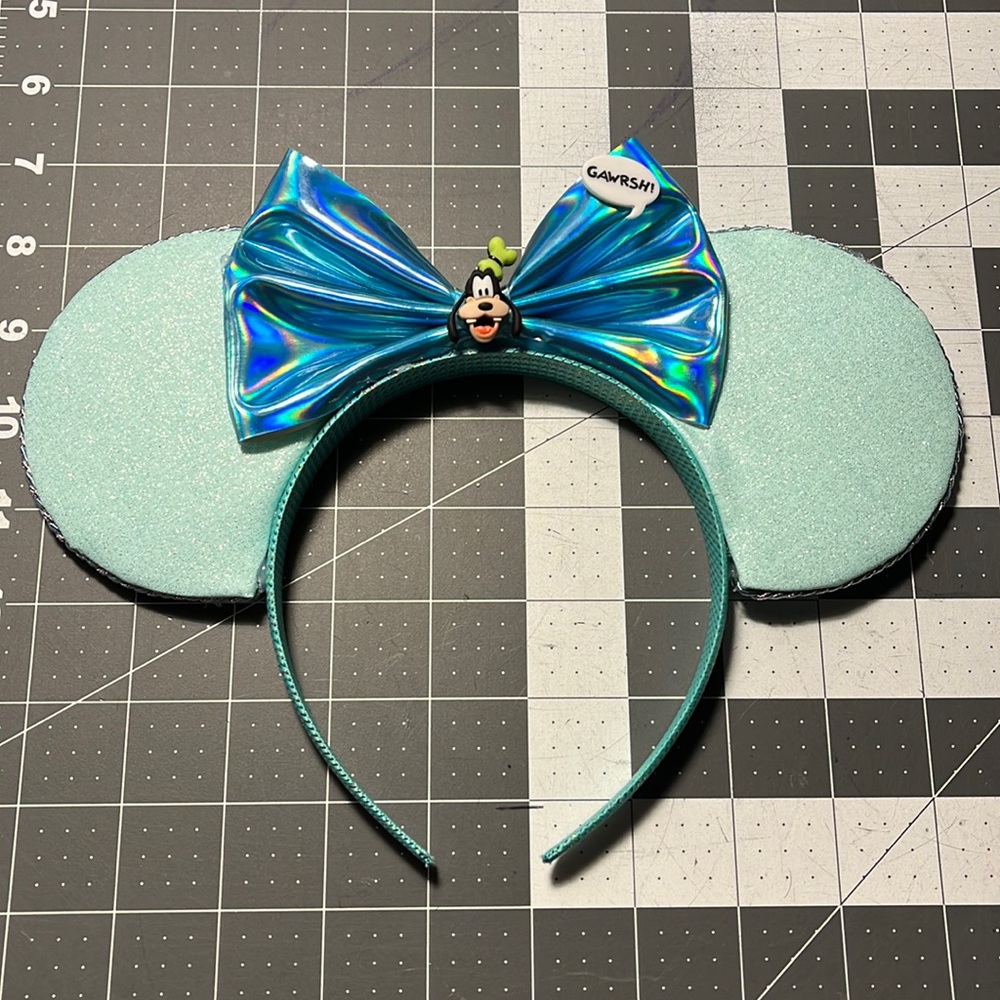NWOT. Glittery Goofy “Gawrsh” Mouse ears